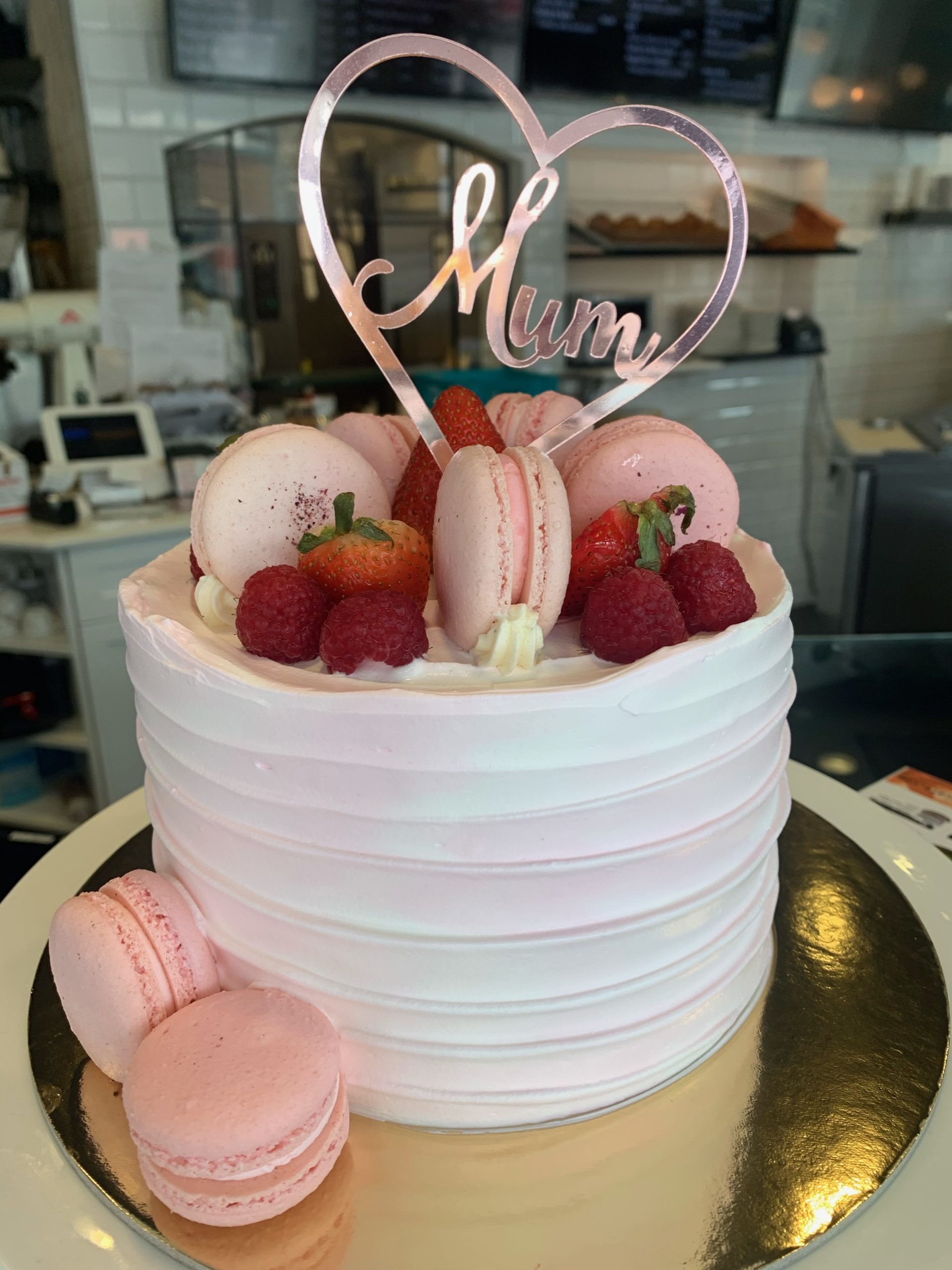 Shelly's Sweet Bakes - Strawberry birthday cake with fresh strawberries and  macarons. Message me to order a cake for your next birthday or special  occasion. | Facebook