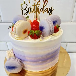 Cake With Purple and White Macaron with Happy Birthday cake topper